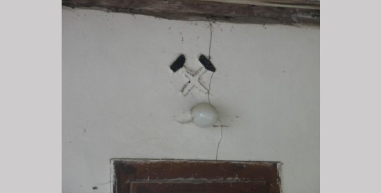 Bergbausymbol am Anželak-Haus – Perkhauz - Bild 1
